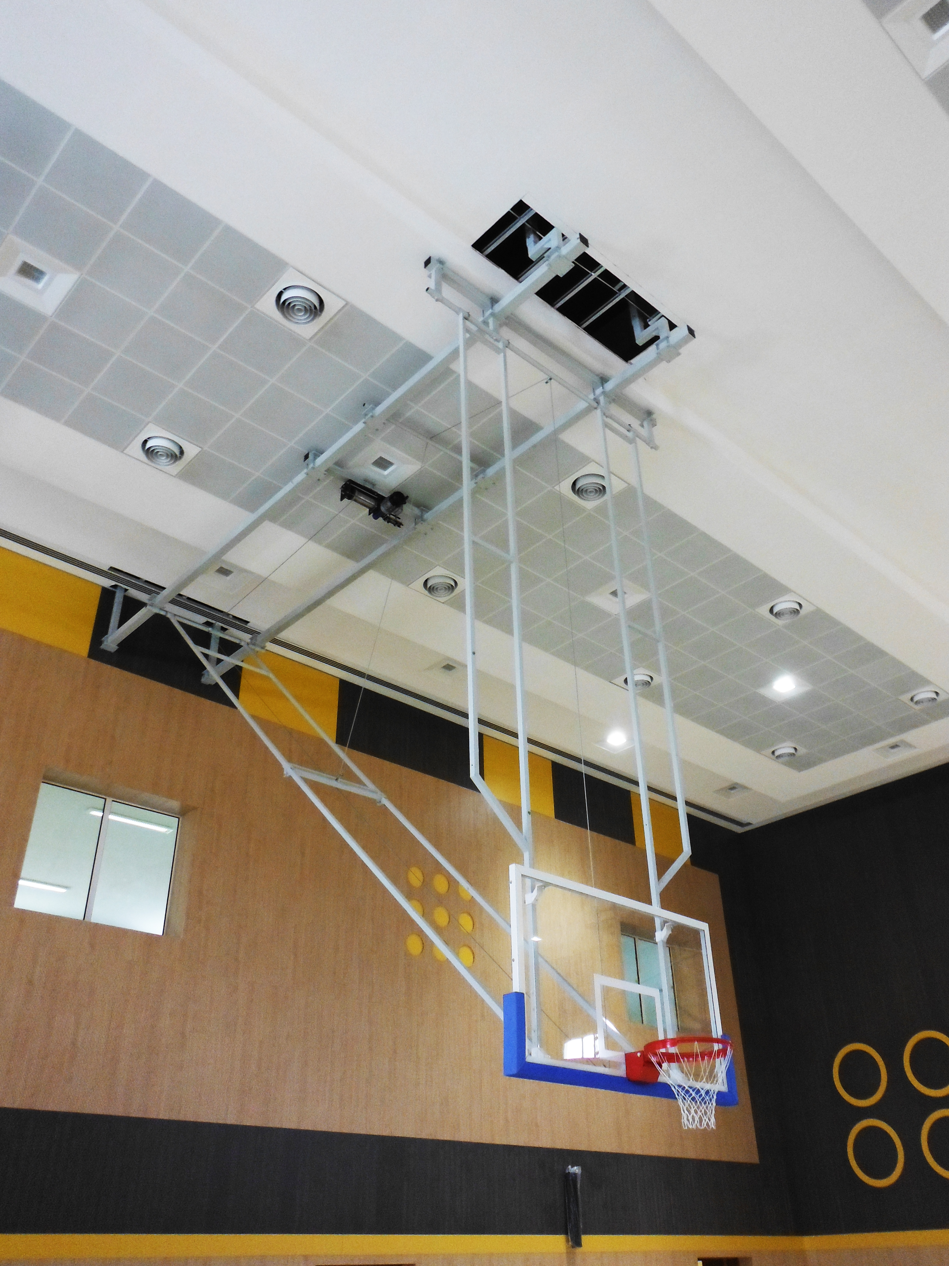Multitube ceiling basketball goal