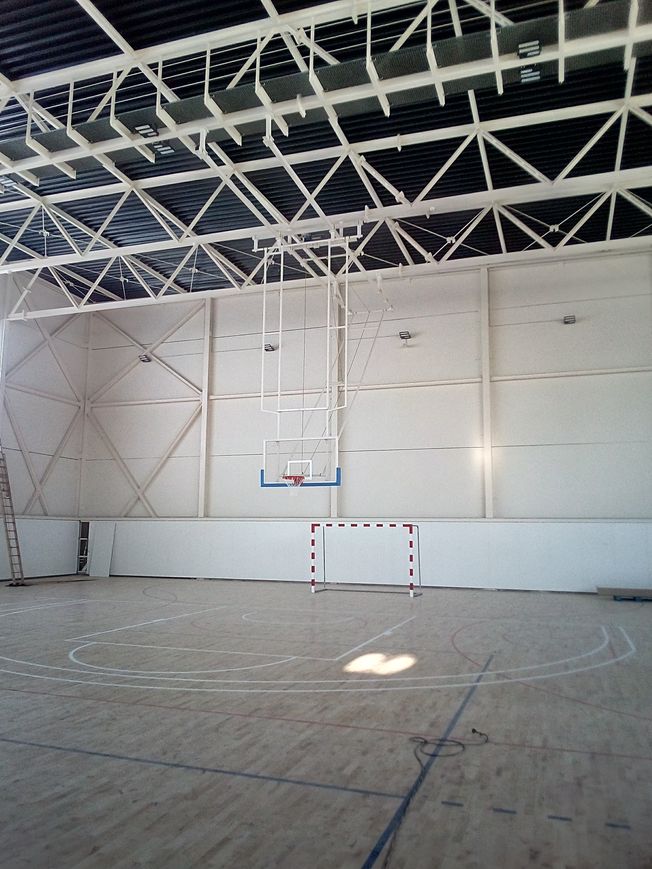 Multitube ceiling basketball goal