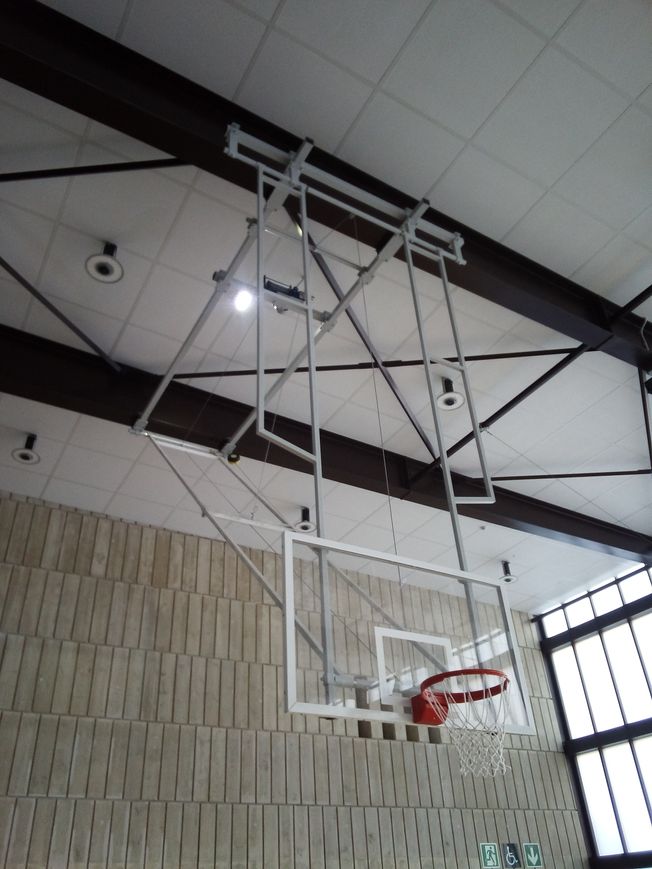 Multitube ceiling basketball goal