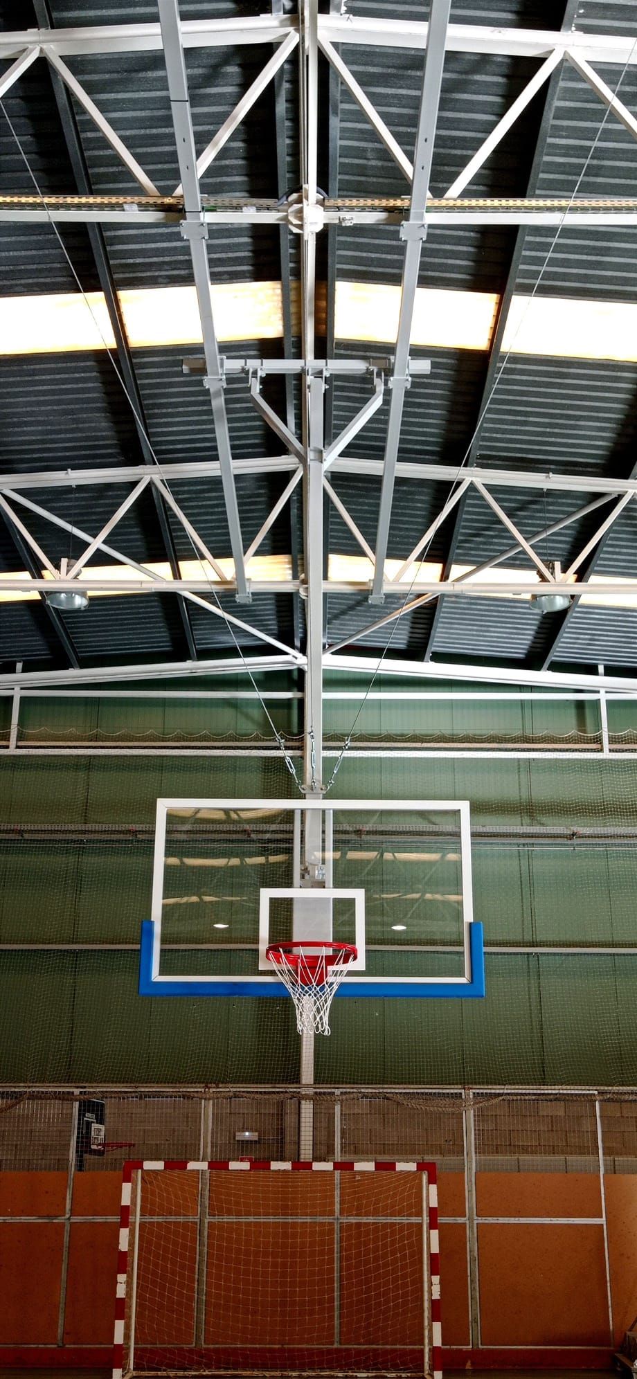 Monotube ceiling basketball goal